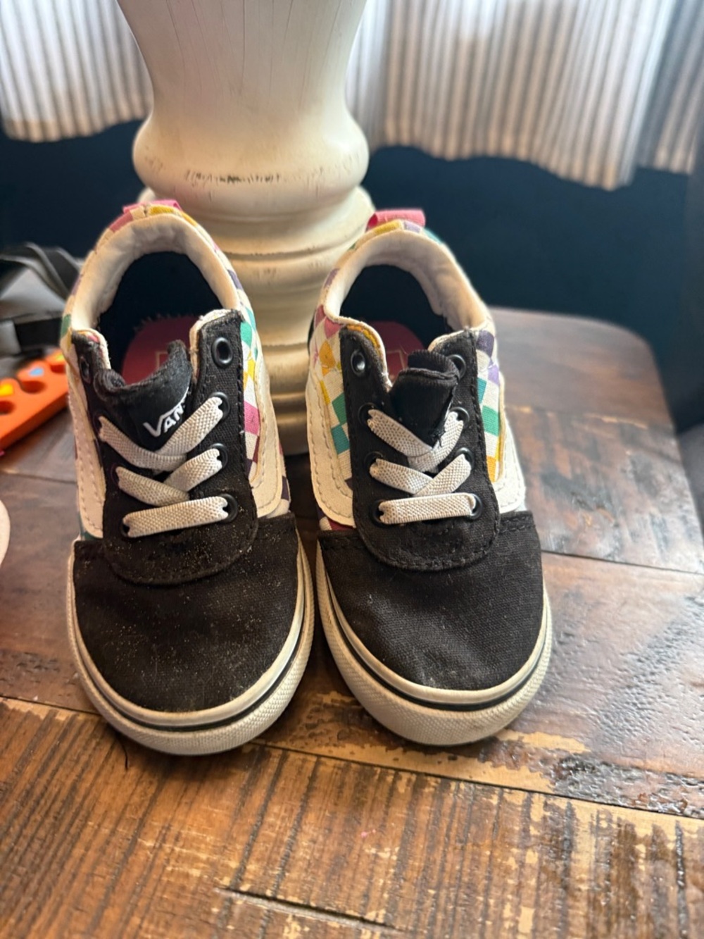 Vans Kids Black Slip-On Sneakers with Rainbow Checker Sides